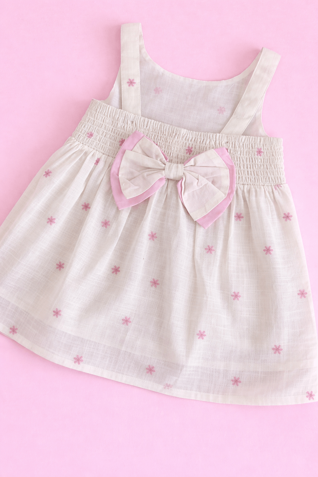Off White Frock with Pink Bow