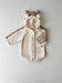 A beige cotton knitted hoodie romper with a teddy bear design, featuring a hood, sleeves, and a front pocket.